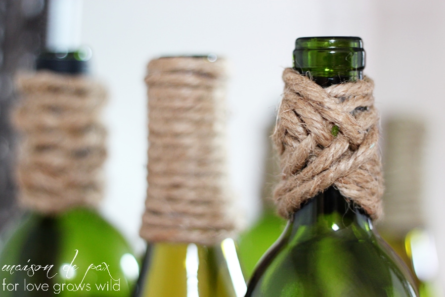 rustic, nautical, versatile wine bottles wrapped in jute twine at maisondepax.com... use them as centerpiece, bookends, vases, or accents!