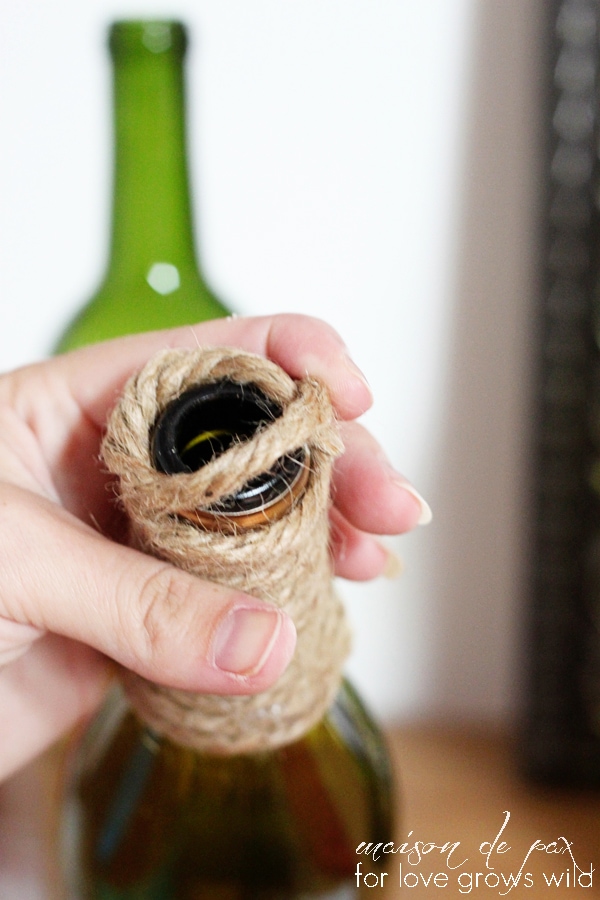rustic, nautical, versatile wine bottles wrapped in jute twine at maisondepax.com... use them as centerpiece, bookends, vases, or accents!