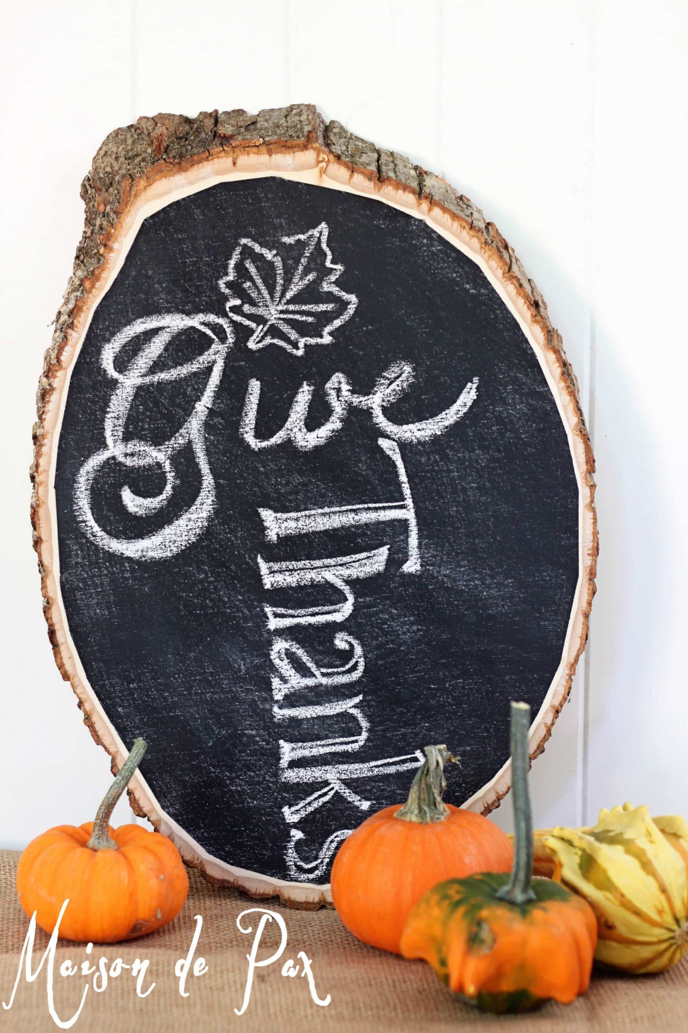fall vignette using rustic wood chalkboard and small gourds