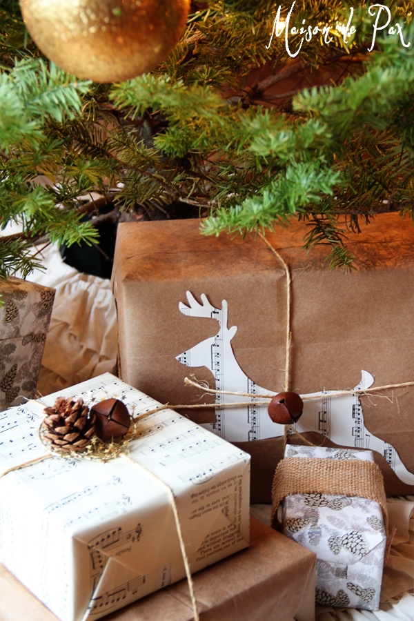 simple and stunning gift wrap ideas: brown bags, sheet music, and silhouettes
