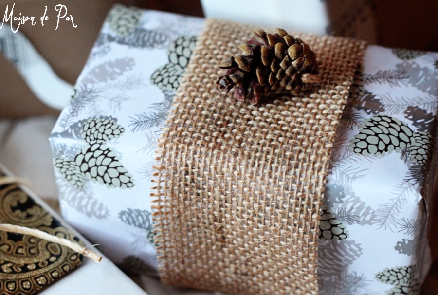 simple and stunning gift wrap ideas: hot glue pinecones as embellishments