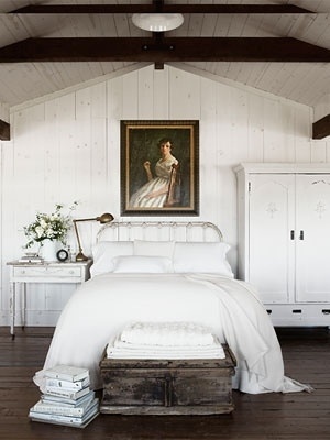 gorgeous white and wood planked attic room