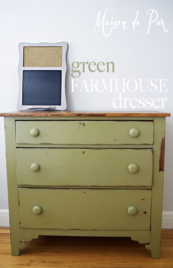an adorable farmhouse dresser makes a bold statement in a natural green