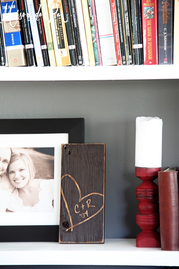 Ideas for layering bookshelf decor with an adorable rustic wood sign... plus a giveaway!