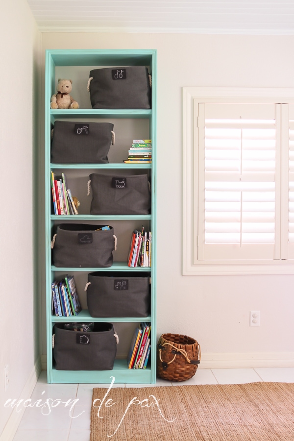 Fabulous "vintage aqua" bookcase makeover for adorable and functional playroom storage at maisondepax.com #makeover #furniture #paint #diy #tutorial #chalkpaint