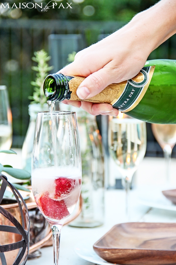 A delicious and super simple strawberry champagne cocktail - perfect for celebrating any occasion | maisondepax.com