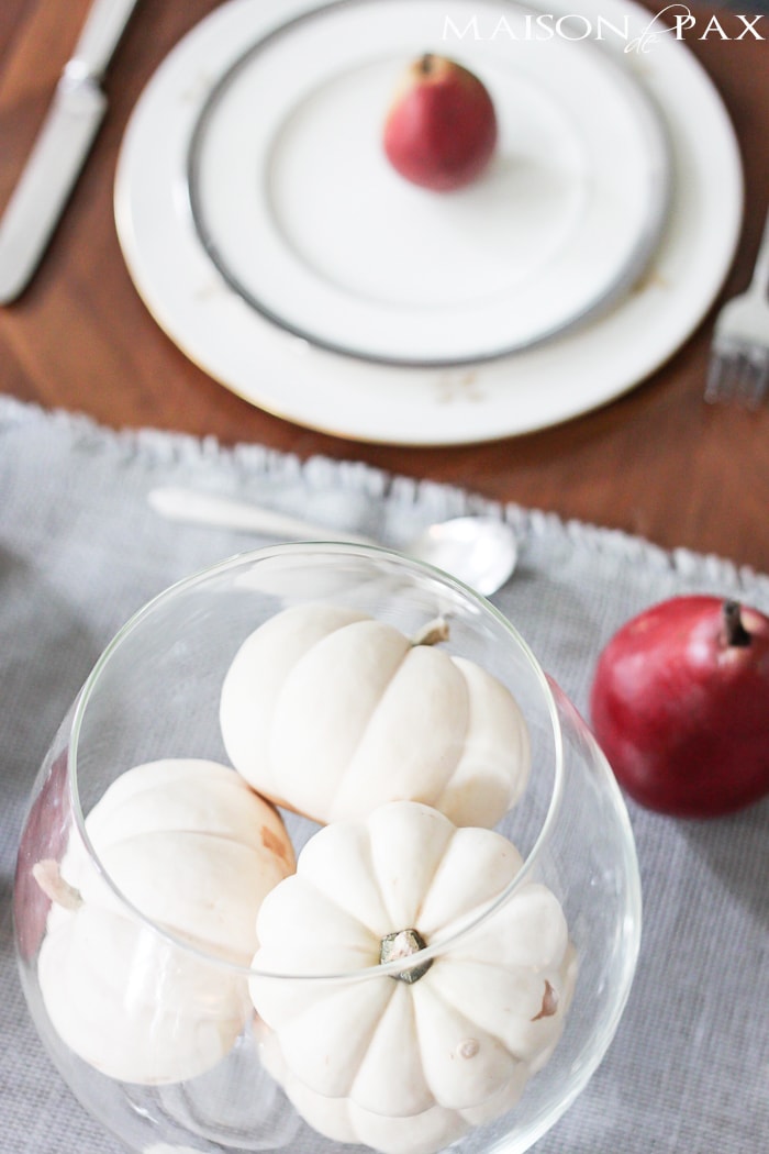 How to set a gorgeous Thanksgiving table: step by step process for a beautiful fall tablescape and gorgeous inspiration with white pumpkins, fall foliage, pears, and natural textures | maisondepax.com