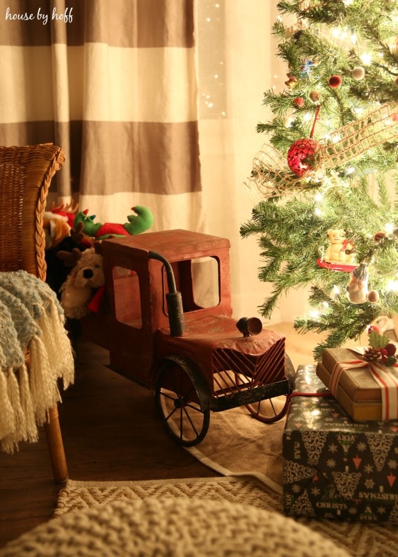love the antique truck by the tree!
