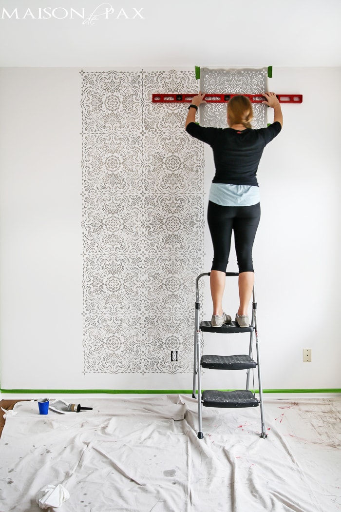 tip: use a level to check your placement as you move along a wall stencil project