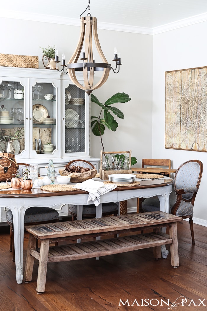 beautiful french dining room with classic french country dining furniture balanced by a rustic bench | maisondepax.com