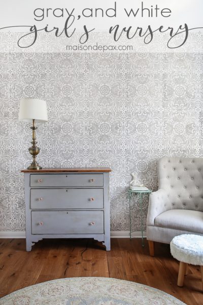 I just love this room! Gray and White Girl's Nursery: patterned stencil accent wall and soft gray and white textures create a beautiful, serene space for a little girl | maisondepax.com