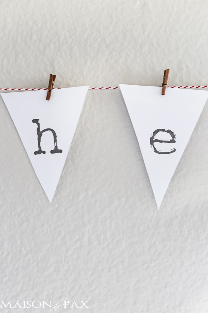 "he first loved us" adorable printable bunting on red and white baker's twine - Maison de Pax