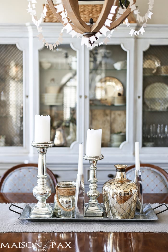 mercury glass vases and candlesticks on a galvanized tin tray makes a beautiful elegant yet rustic centerpiece for a dining room table