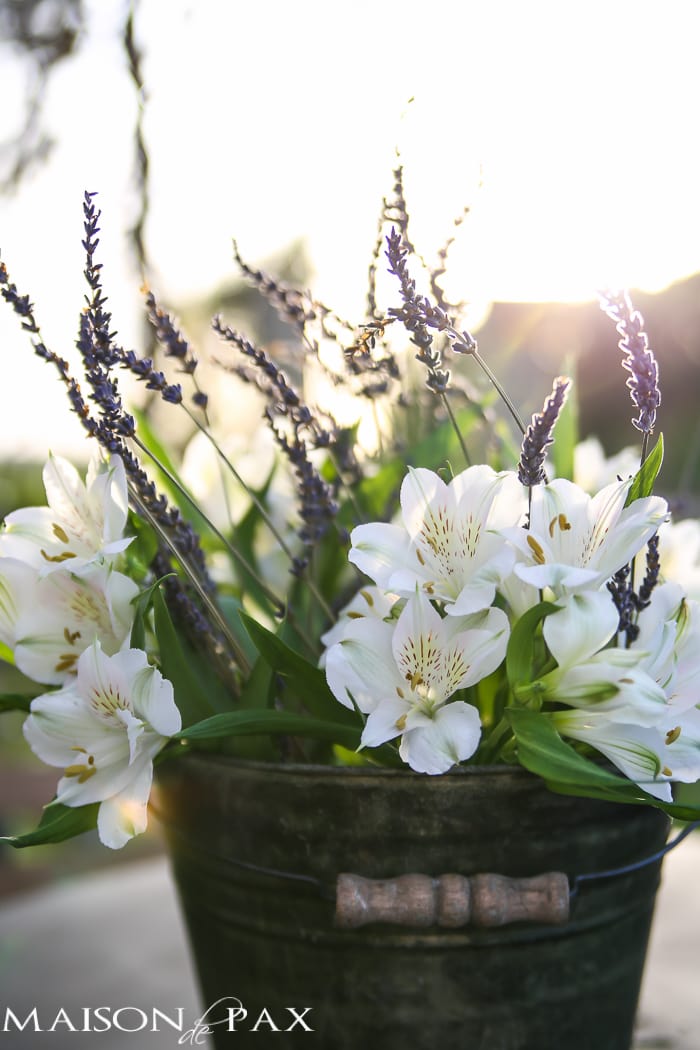 lavender and alstroemeria in a rustic bucket - such a simple and elegant centerpiece | maisondepax.com