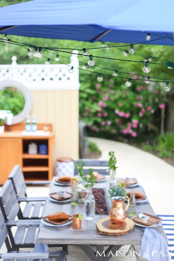 Outdoor Decorating Tips: globe string lights at instant ambiance to an outdoor dining space