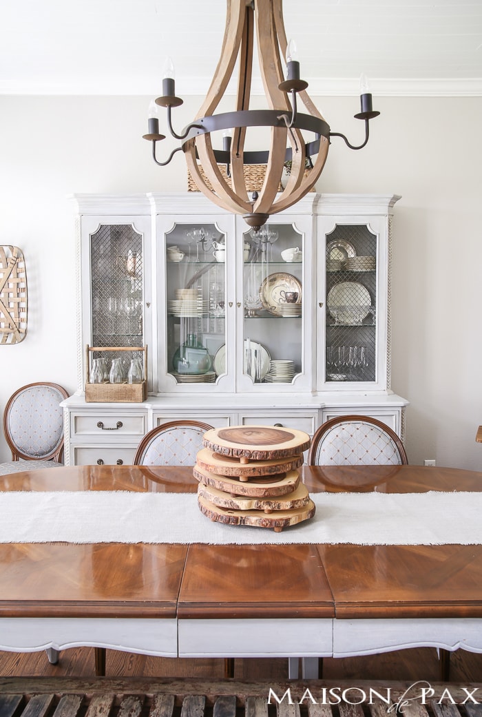 Love this dining room! French furniture, wine barrel chandelier, and rustic accents