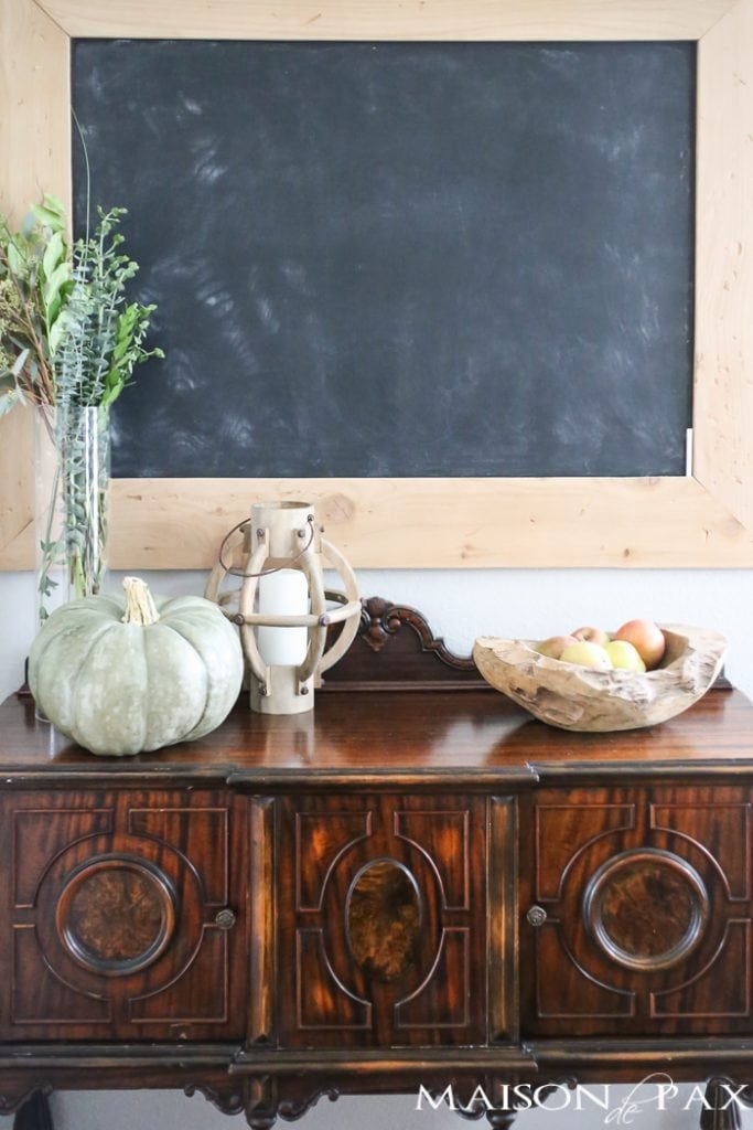 Be inspired to create a gorgeous, rustic Thanksgiving tablescape with these Thanksgiving decorating ideas! This table incorporates plaid, copper, and wood to create a beautiful yet relaxed look.