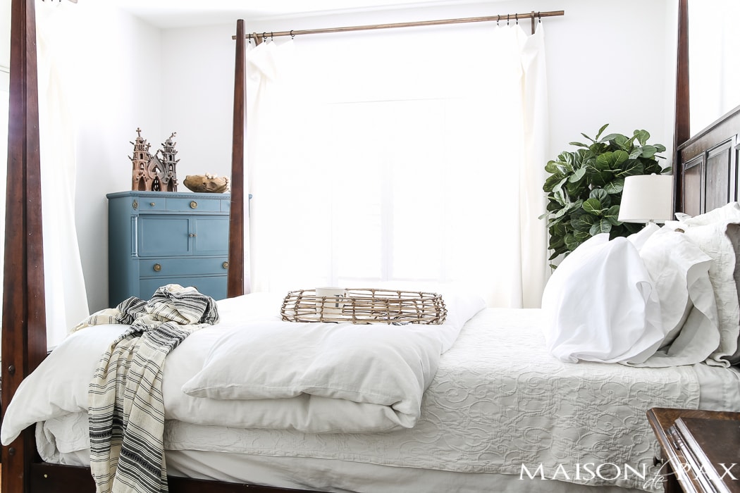 Relaxed, natural, neutral master bedroom with lots of white and touches of boho texture... the perfect retreat!