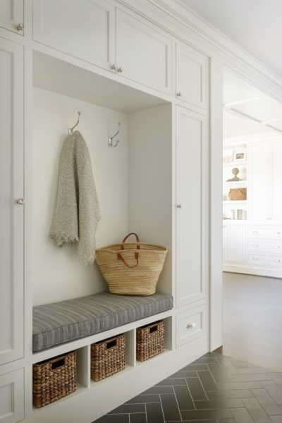 Mudroom ideas for different spaces! Get ideas for how to design a mudroom for small spaces, laundry rooms, hallways, and more.