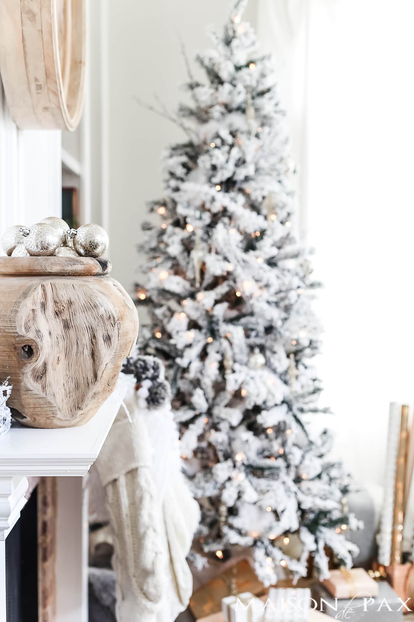 white and cream and blush Christmas decorations: mantel, flocked tree, stockings #neutralChristmasdecor