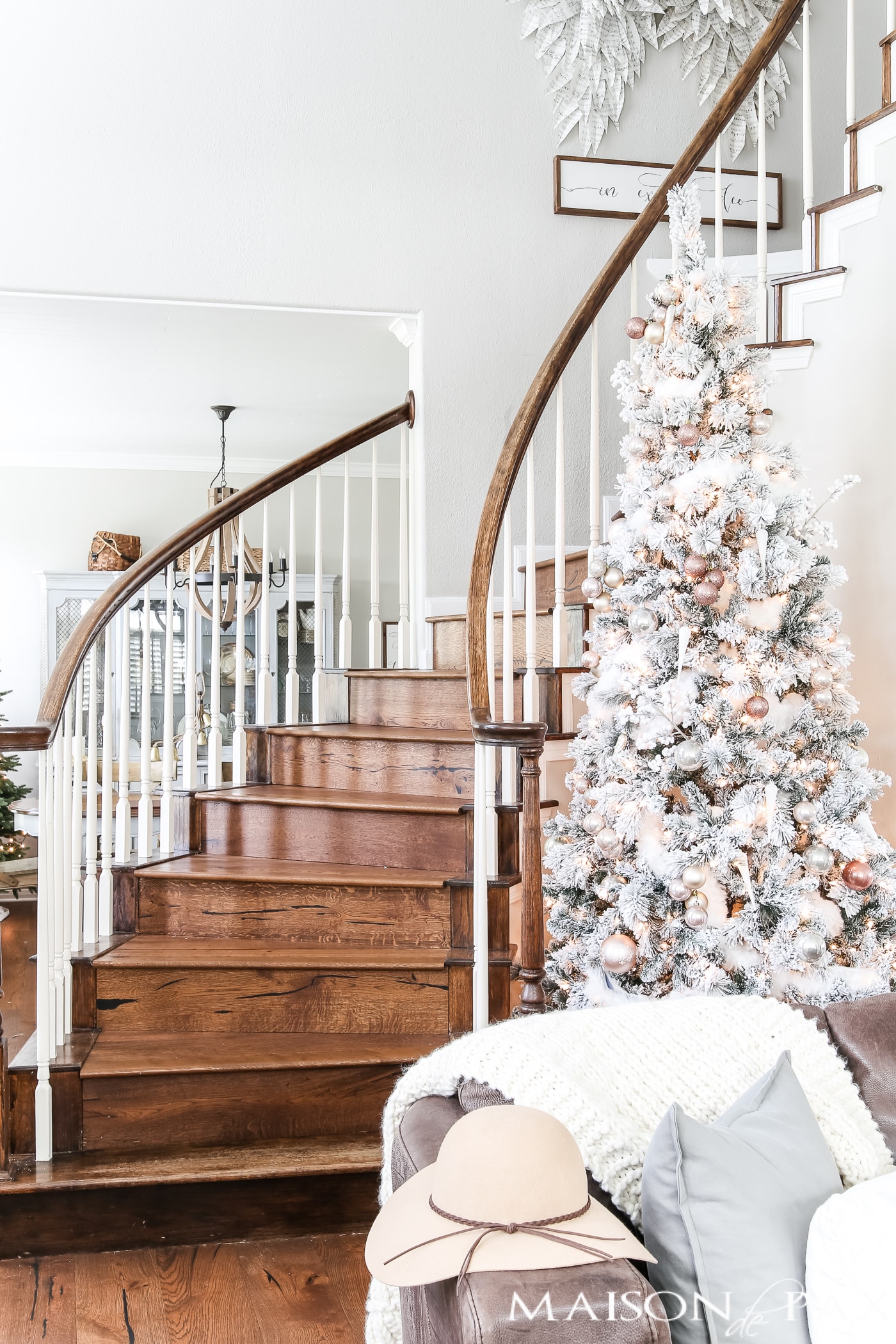 This blush flocked Christmas tree is a soft, almost neutral spin on a traditional holiday tree.  Find out how to get the look of this blush Christmas tree the easy way! #blushchristmastree