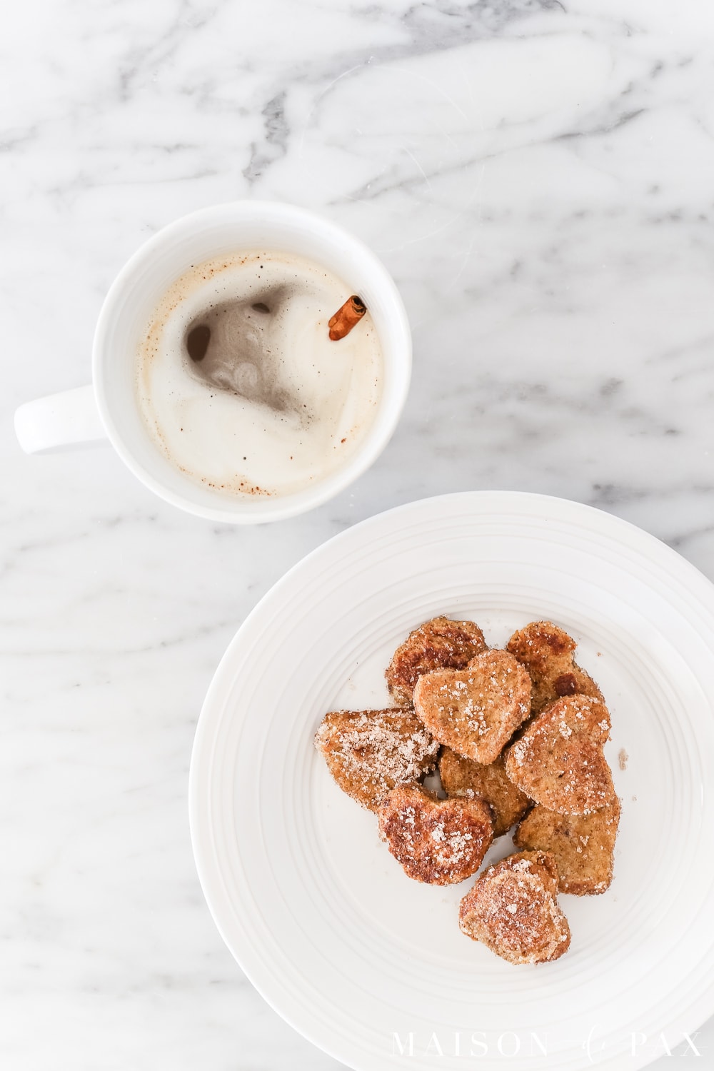 Heart French toast bites make the perfect Valentines breakfast. Get the full recipe for this easy treat! #valentinesrecipe #valentinesbreakfast #hearttoast #frenchtoast #valentinestreat