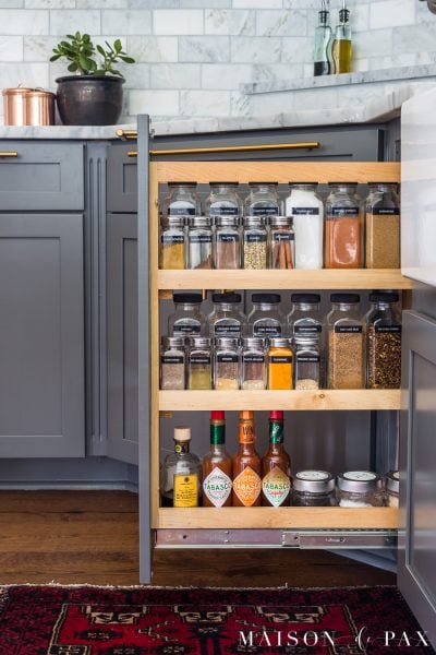 Find out where to get supplies to organize your spices just like this! #spiceorganizer #spiceorganization #spicecabinet #spicepullout #kitchenorganization #spiceorganizer #organize #organization