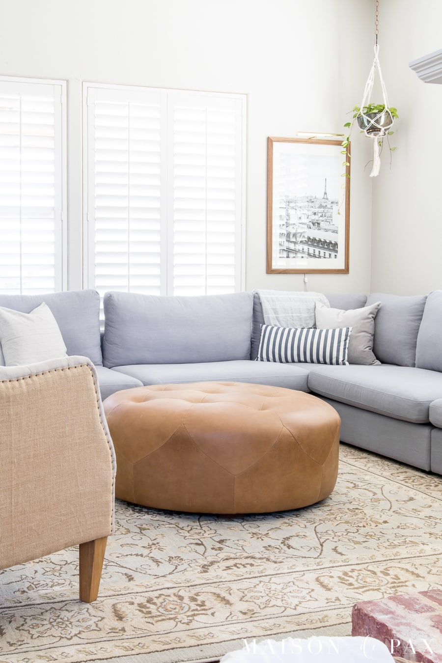 Bright living room design with sectional- Maison de Pax