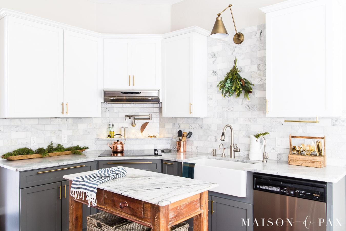 white upper cabinets and grey lower cabinets in a christmas kitchen- Maison de Pax