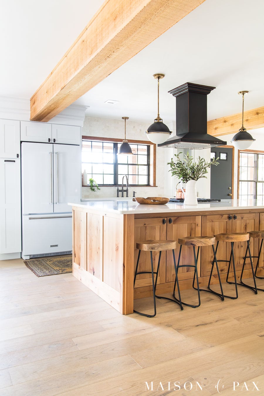 big island kitchen with wood floors | Maison de Pax