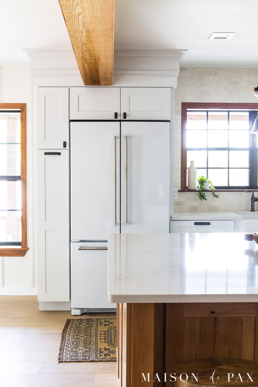 white kitchenaid counter depth fridge in rustic modern kitchen | Maison de Pax