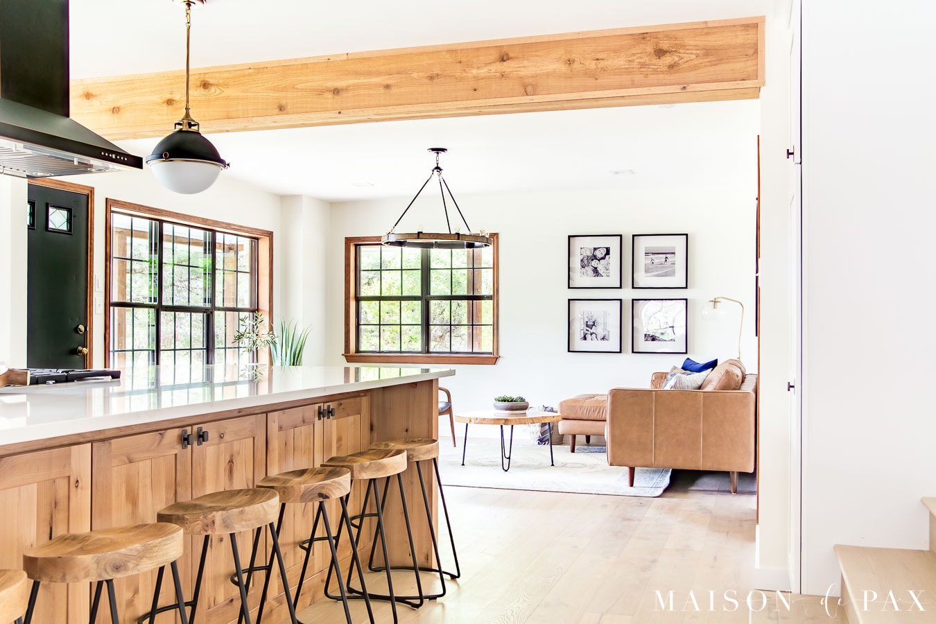 open concept kitchen with big island and rustic beams | Maison de Pax