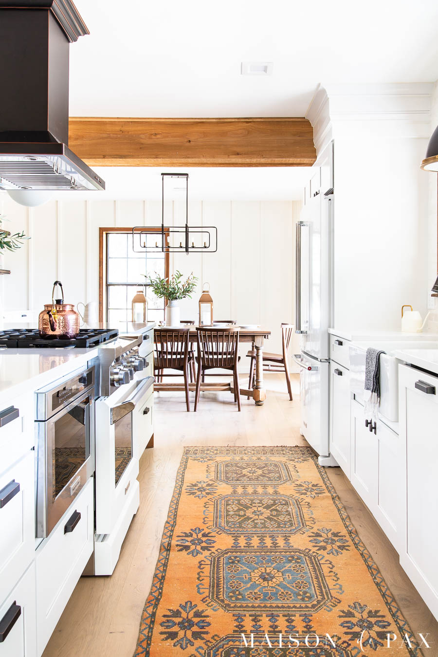 white kitchen with wood beams | Maison de Pax