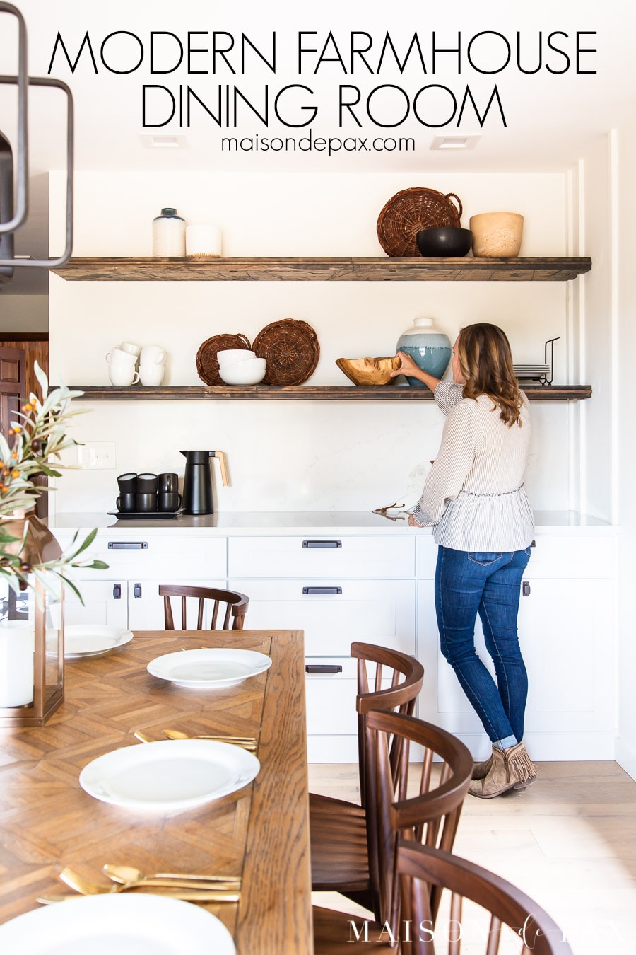 woman placing dishes on open shelving in dining room | Maison de Pax
