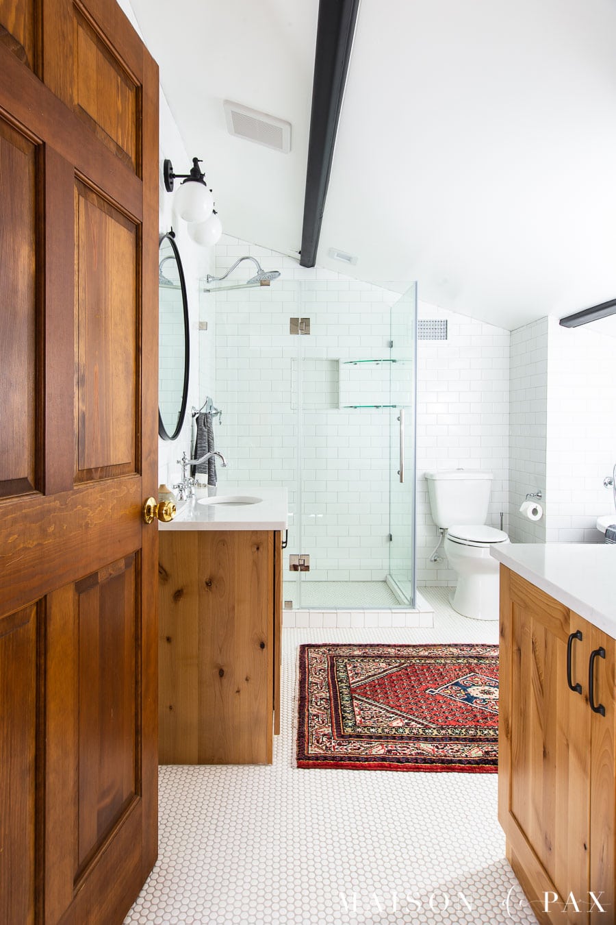 wood bathroom vanity in white tile bathroom | Maison de Pax