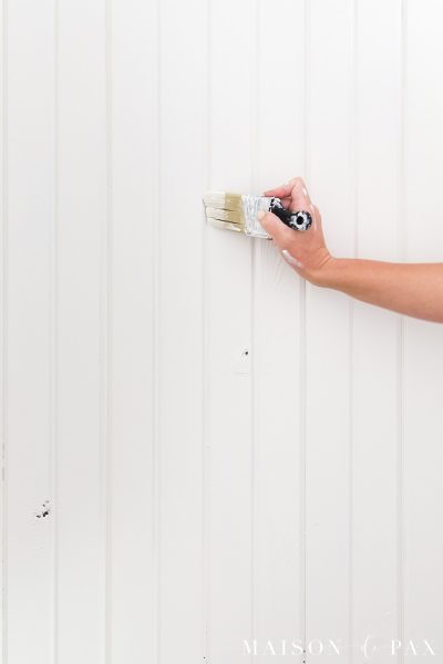 use a small angled brush to paint the grooves on wood paneling | Maison de Pax