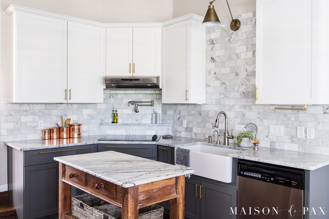 marble kitchen with gray and white cabinets and wood island | Maison de Pax