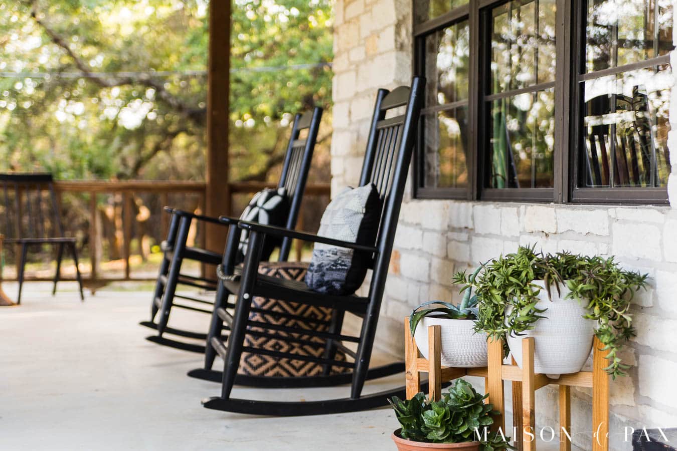 potted succulents and rocking chairs on front porch | Maison de Pax