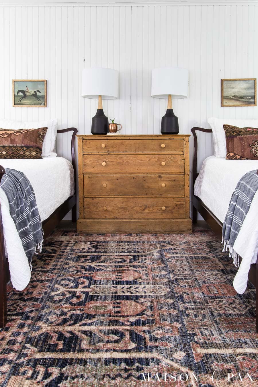 vintage rug and white twin beds | Maison de Pax