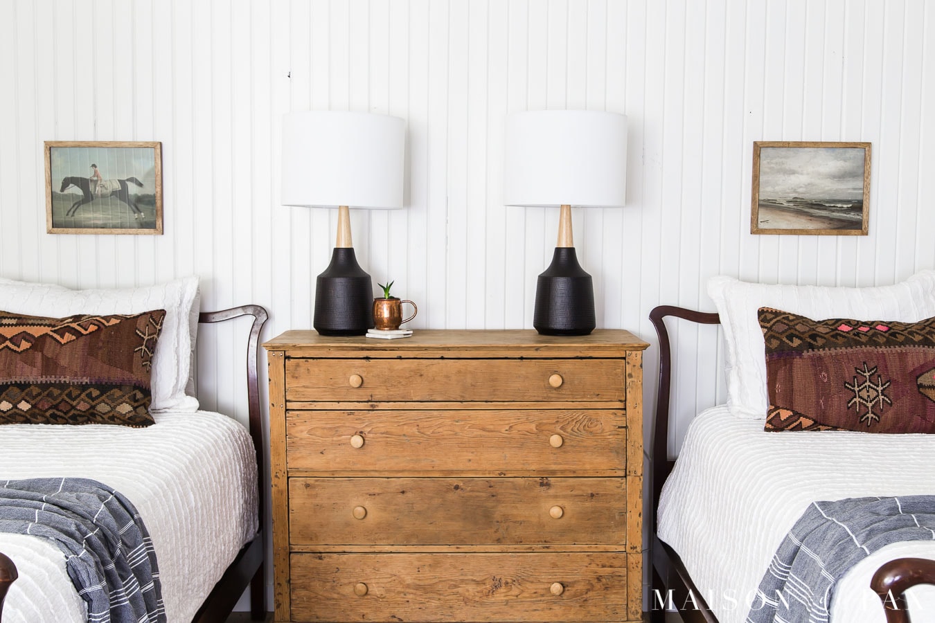antique wood twin beds with rustic raw pine dresser in white farmhouse bedroom | Maison de Pax