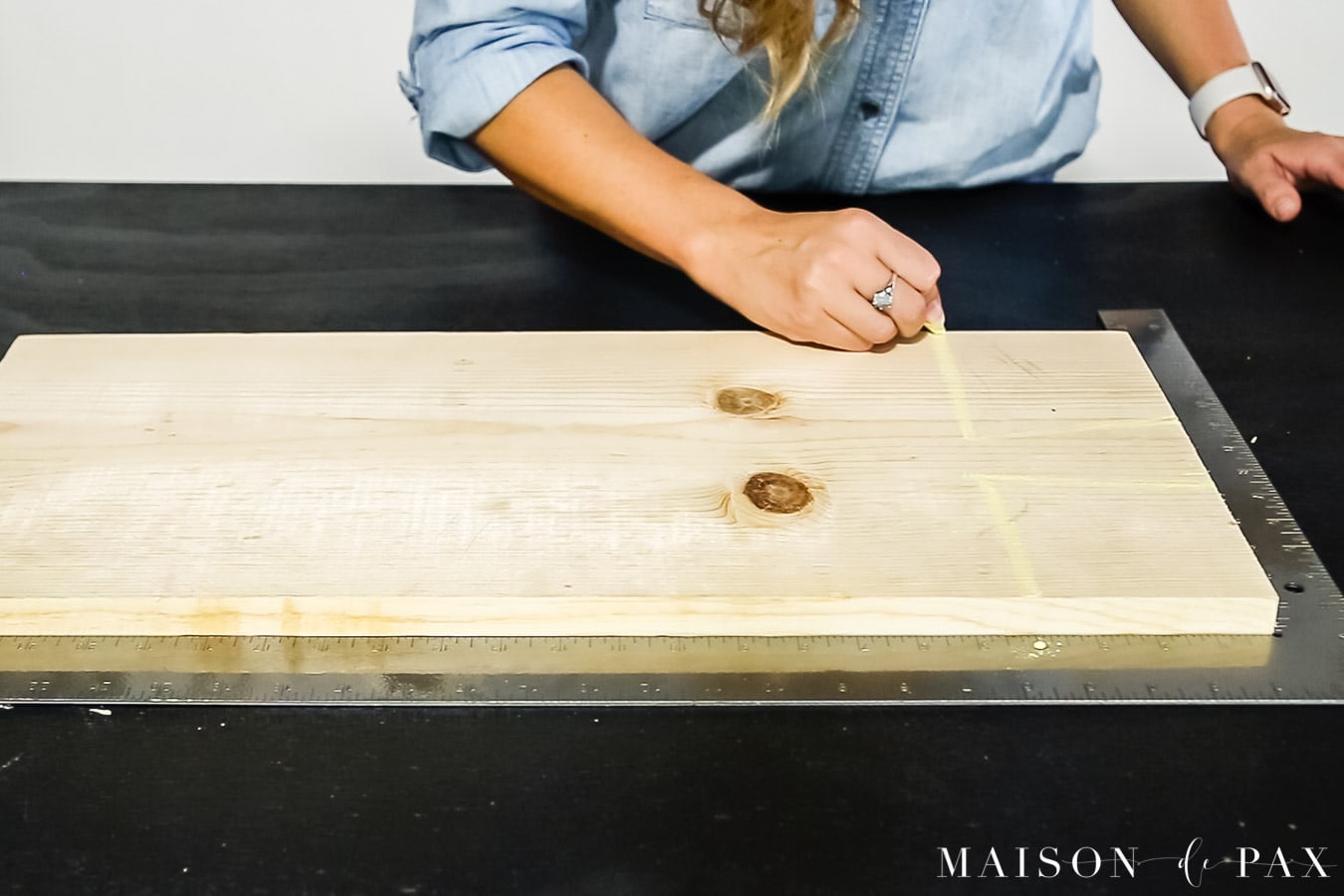 drawing handle on wood cutting board to make antique bread board | Maison de Pax
