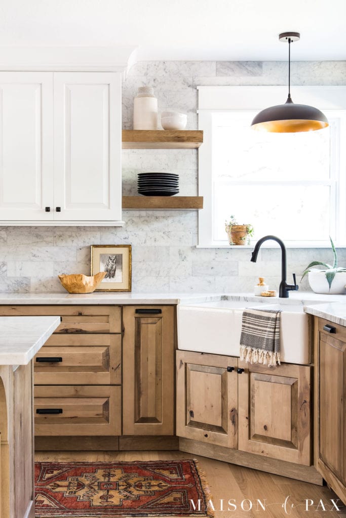 light wood lower cabinets with white upper cabinets