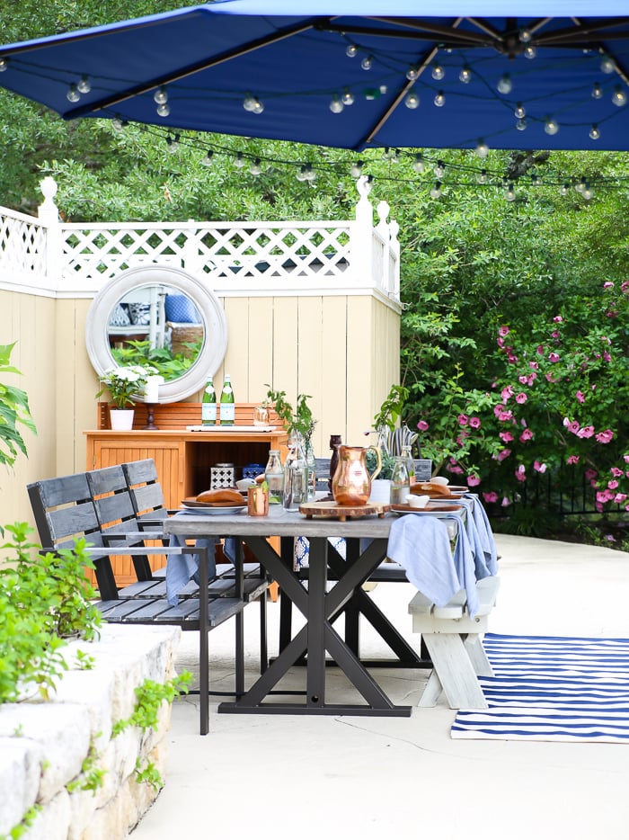 outdoor dining with cantilever umbrella for shade