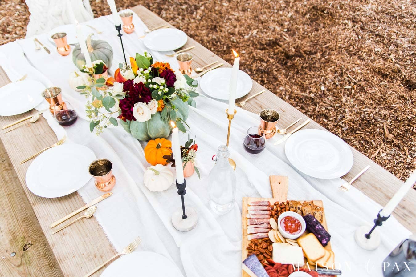 elegant outdoor dining on a picnic table