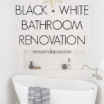 black and white bathroom renovation with tiled tub nook