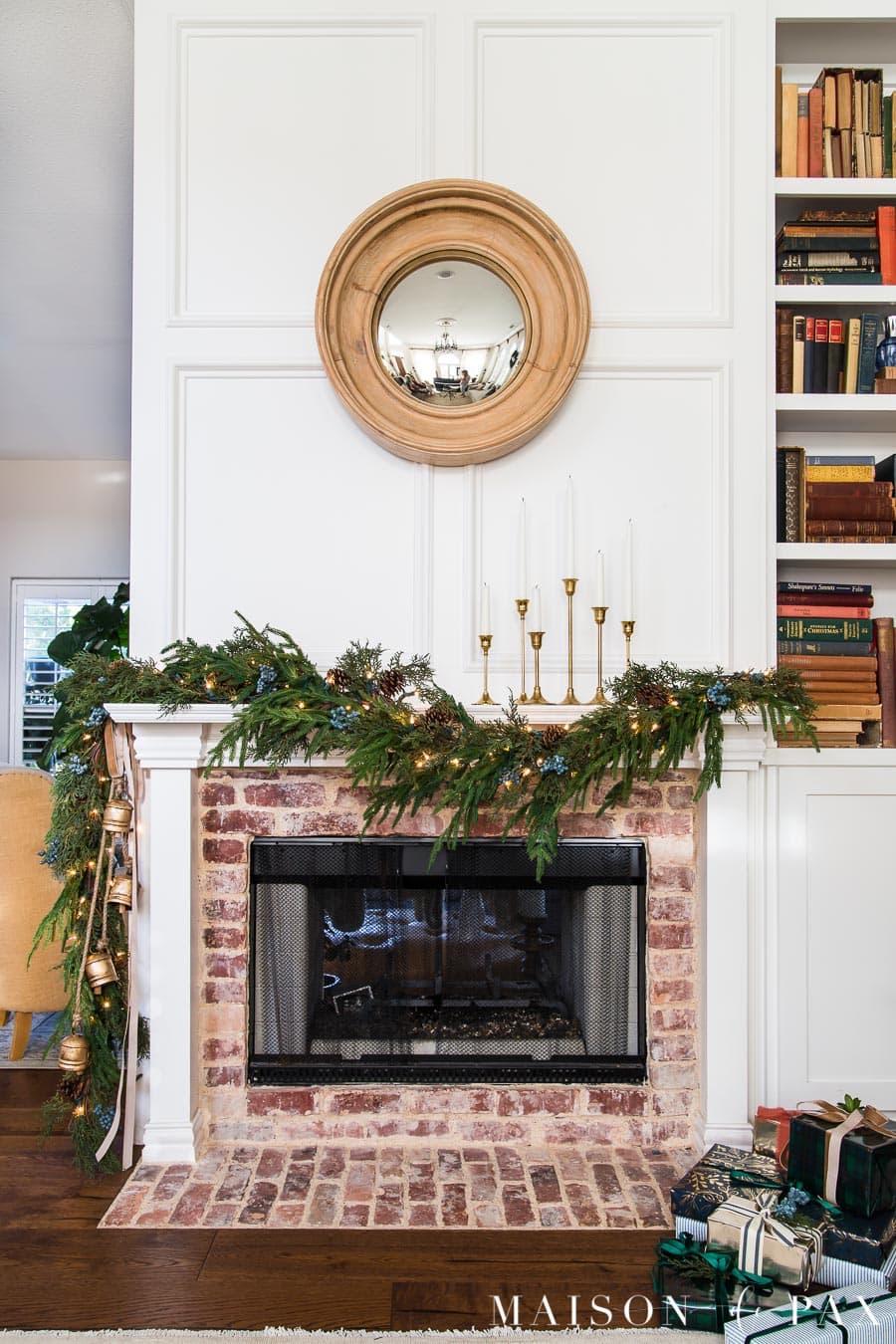 Christmas decor: fireplace with asymmetrical mantel garland