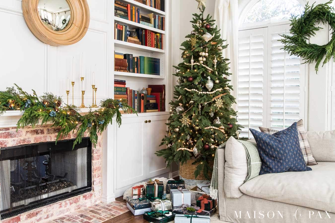 Christmas tree, fireplace, and mantel