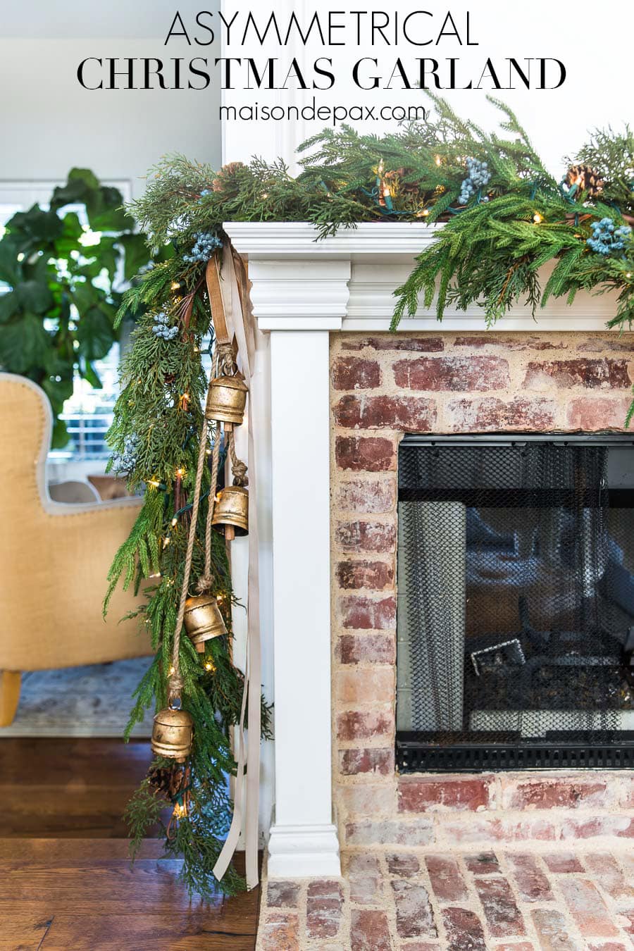 asymmetrical christmas mantel garland fireplace