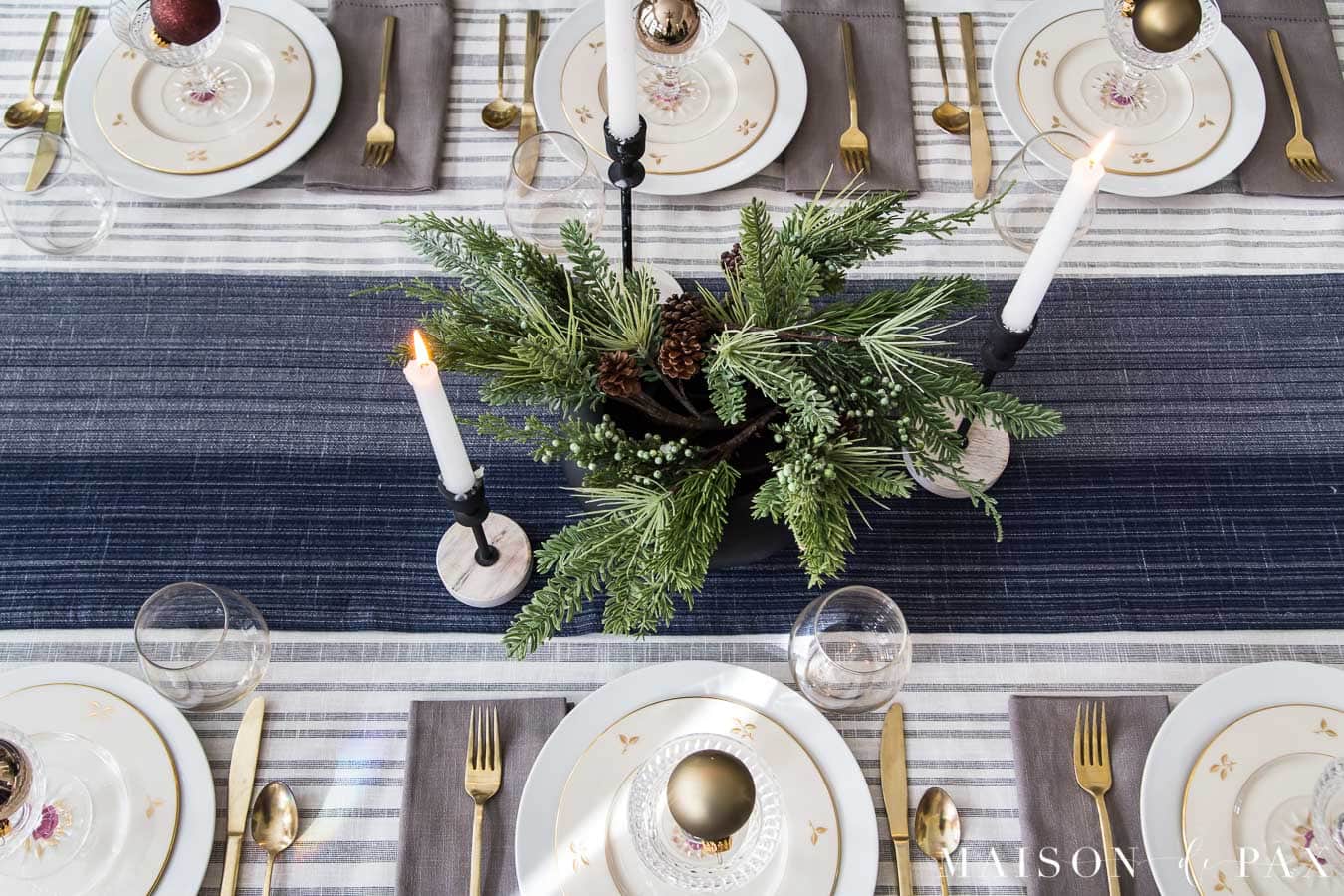 black wood bowl with evergreens for holiday centerpiece ideas
