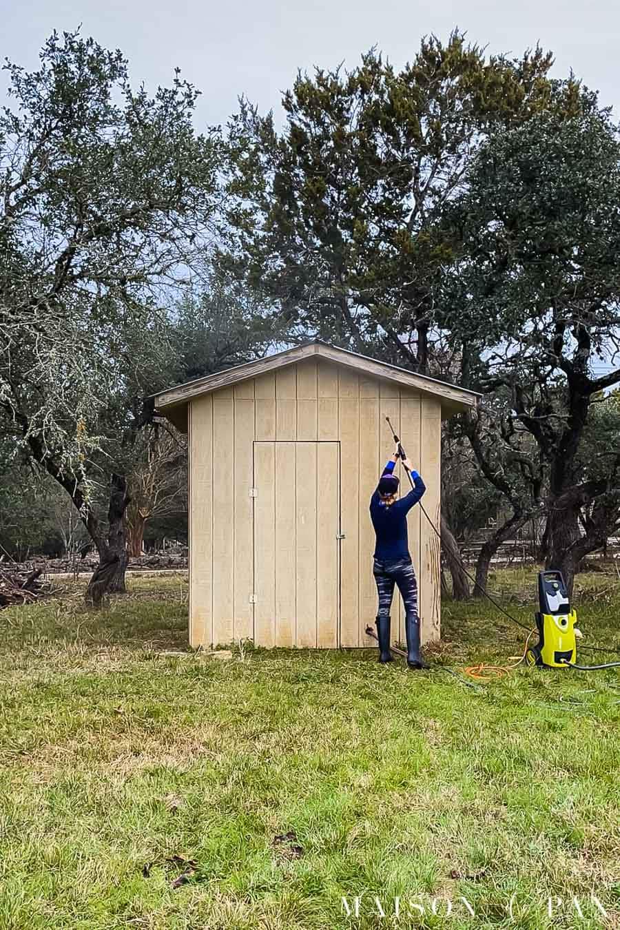 pressure washing a shed before painting a shed